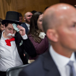 Monopoly Man Crashes Equifax Hearing to Protest Forced Arbitration