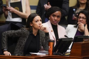 House Oversight and Reform Committee members, from left, Rep. Alexandria Ocasio-Cortez, D-N.Y., Rep. Ayanna Pressley, D-Mass., and Rep. Rashida Tlaib, D-Mich., listen during a committee hearing on Capitol Hill in Washington, Tuesday, Feb. 26, 2019. The committee voted to subpoena Trump administration officials over family separations at the southern border, the first issued in the new Congress as Democrats have promised to hold the administration aggressively to count. The decision by the Oversight Committee will compel the heads of Justice, Homeland Security and Health and Human Services to deliver documents.  (AP Photo/J. Scott Applewhite)
