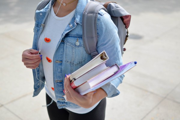 a student with books - Photo by Element5 Digital on Unsplash